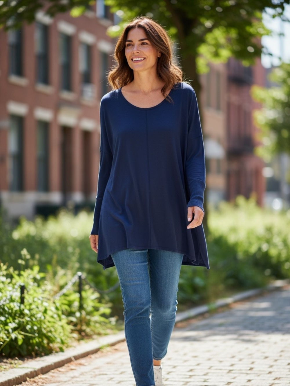 H&M navy blue long-sleeve tunic top with a relaxed fit and ribbed cuffs.